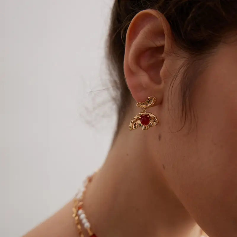 Model wearing agate butterfly earrings – handmade gold earrings UK by Anais & Aimee
