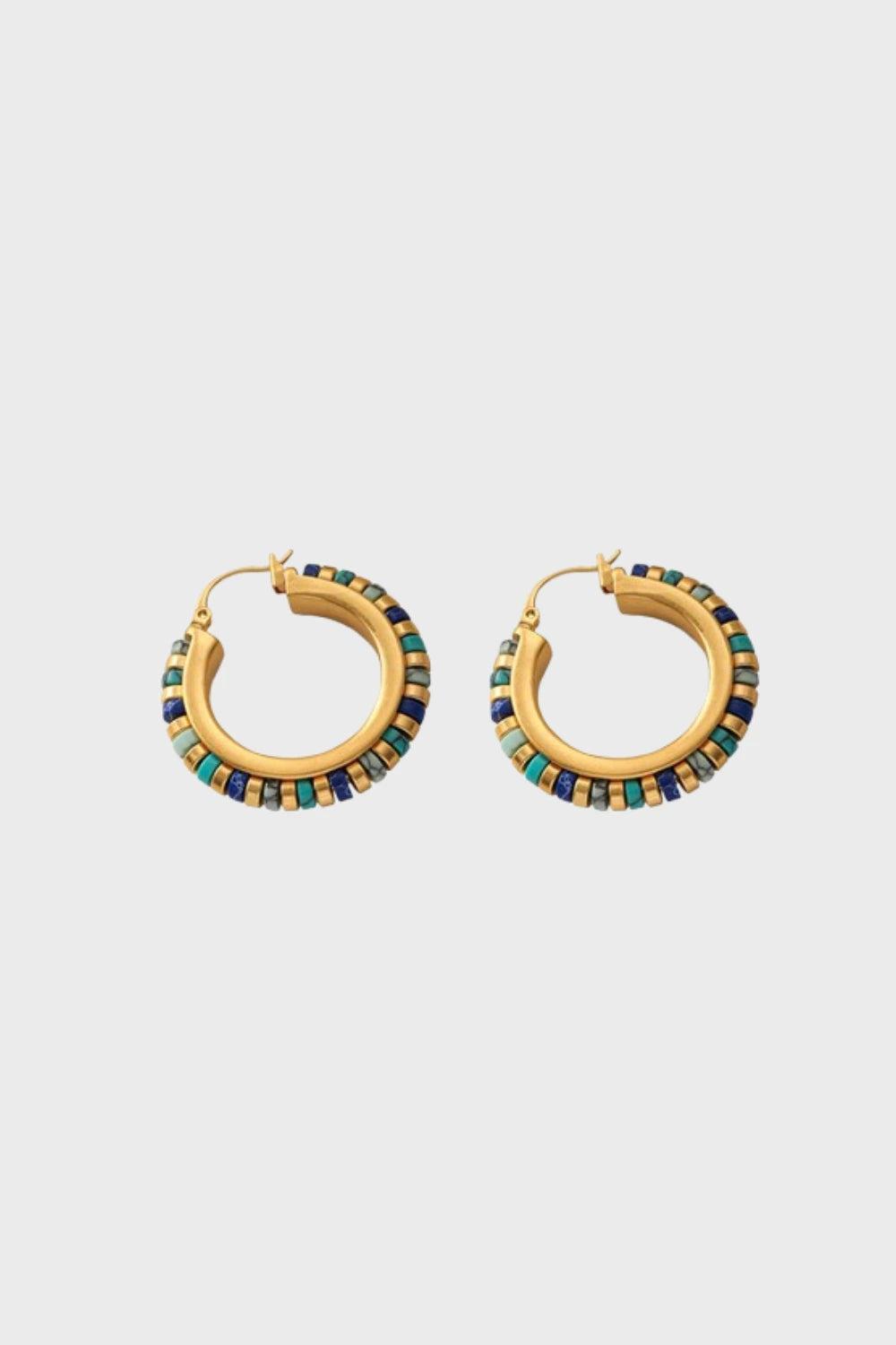 Gold-plated hoops with turquoise, lapis, and green beads on light background.