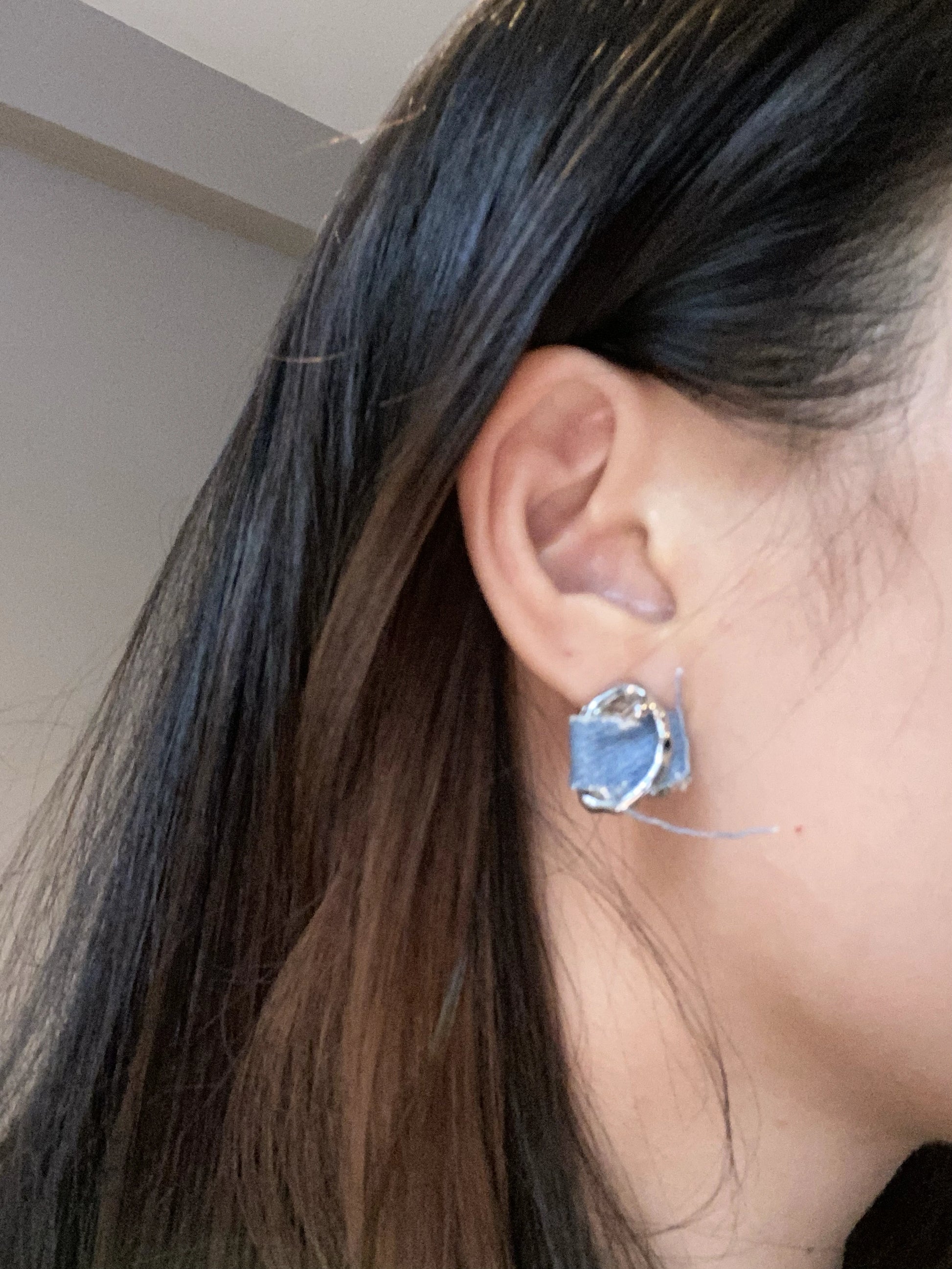 Anais&Aimee close up Denim Angel Silver Statement Earrings side profile UK fashion