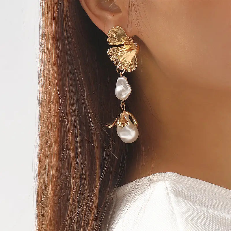 Gold ginkgo leaf earring with baroque pearls and a teardrop pendant for elegant style