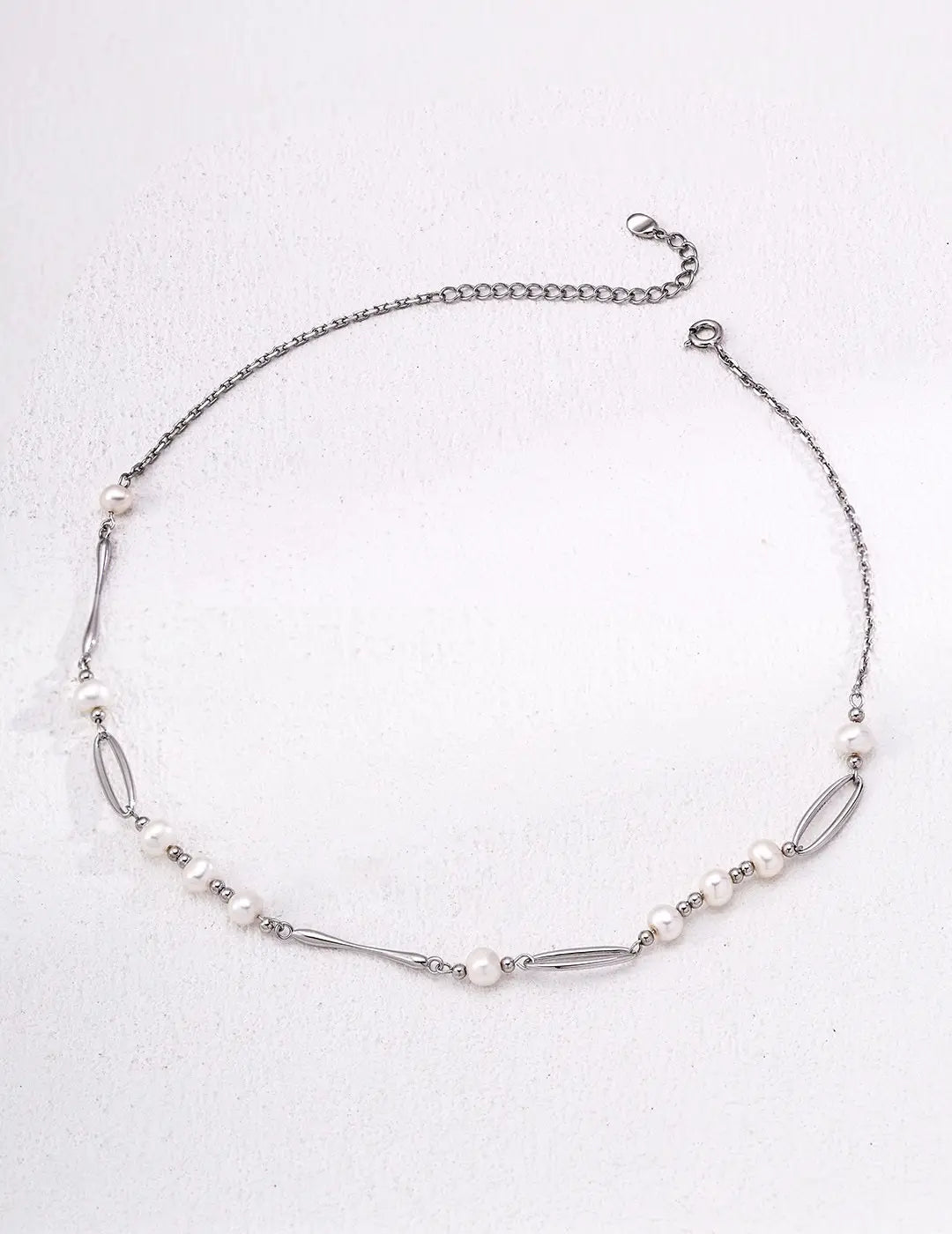 Kingsbury silver freshwater pearl necklace with sterling silver chain, overhead view