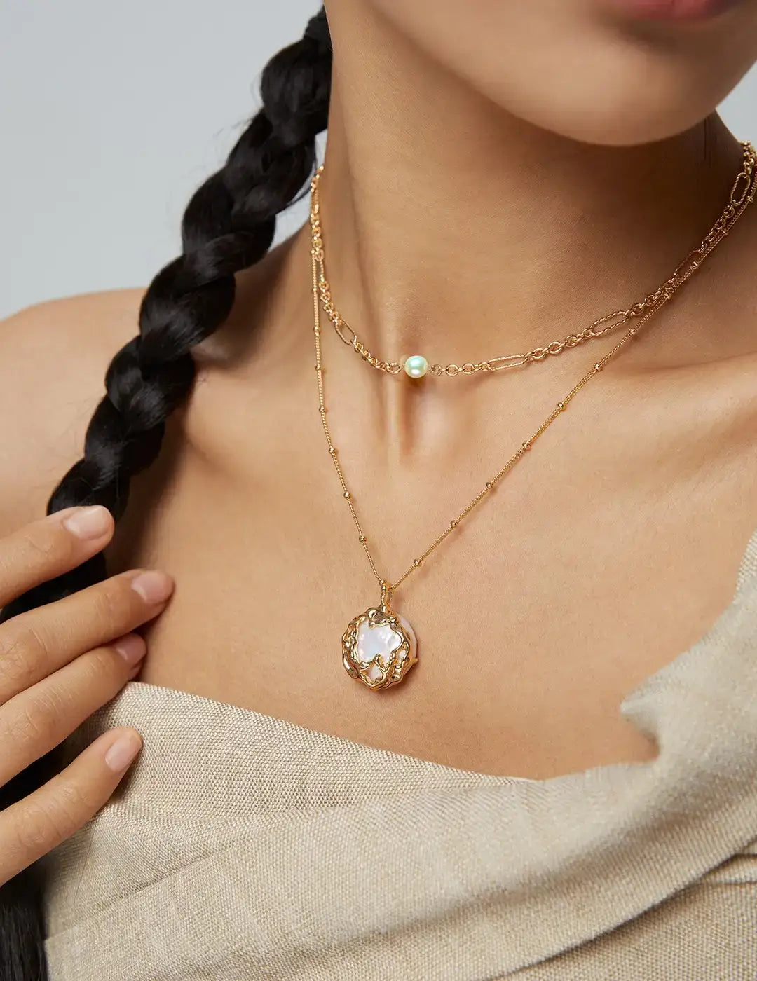 Natural pearl necklace with gold pendant on model – pearl pendant necklace UK