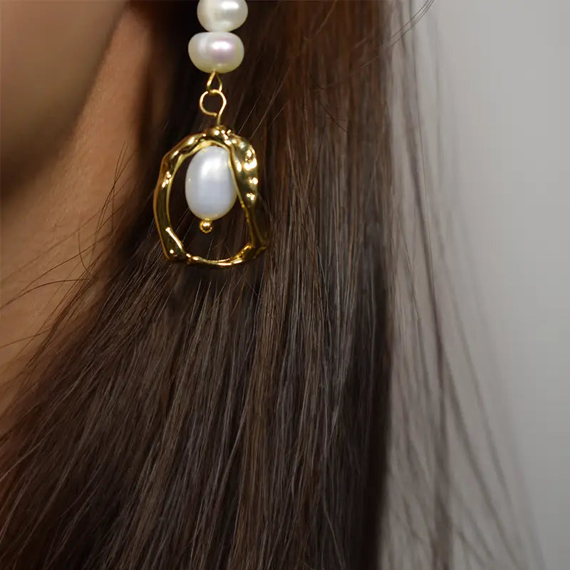 Modern pearl jewellery UK – Anais&Aimee gold pearl jewellery drop earring detail close-up