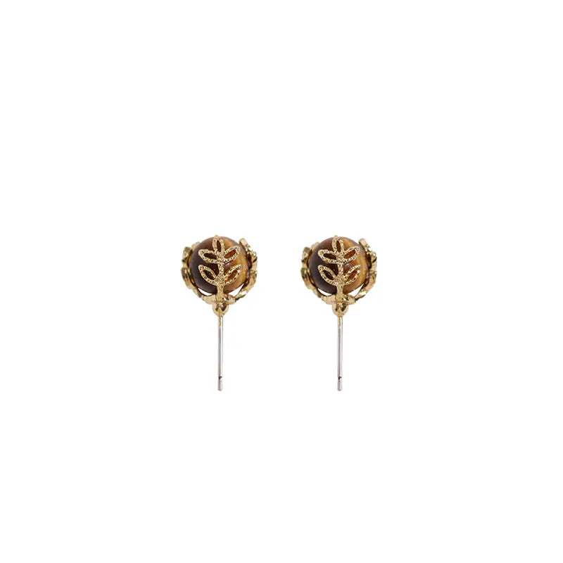 Anaïs & Aimée Tiger’s Eye Juniper Studs with gold-plated leaves and sterling silver posts
