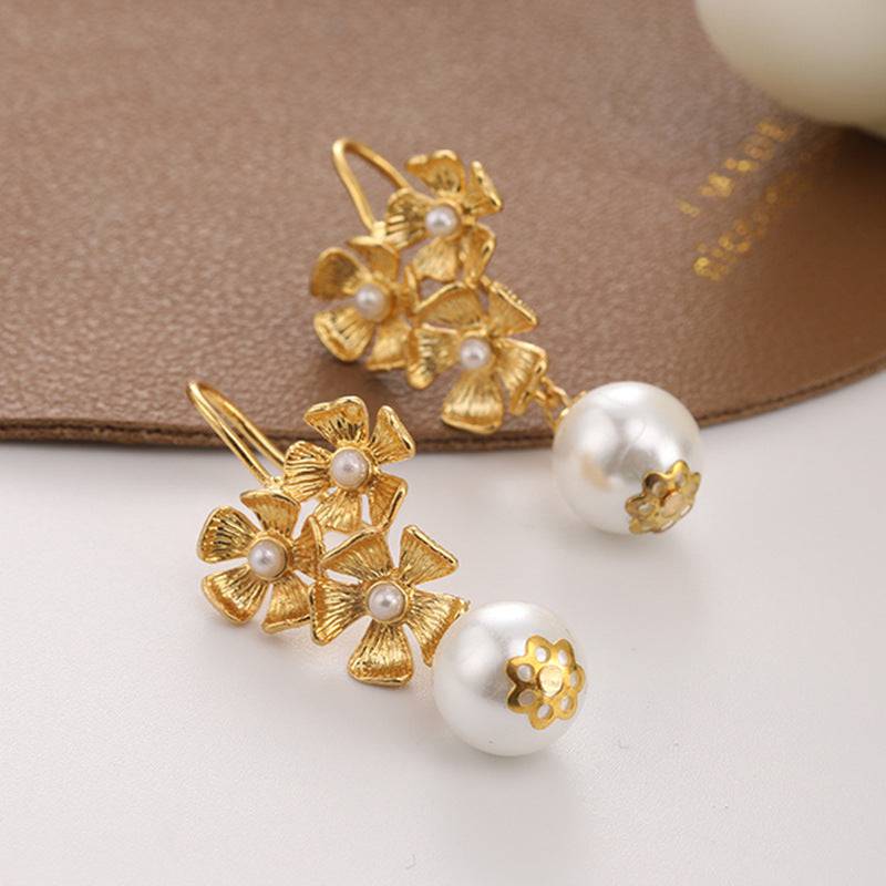 Buy Floral Motif Gold Plated Pearl Drop Earrings