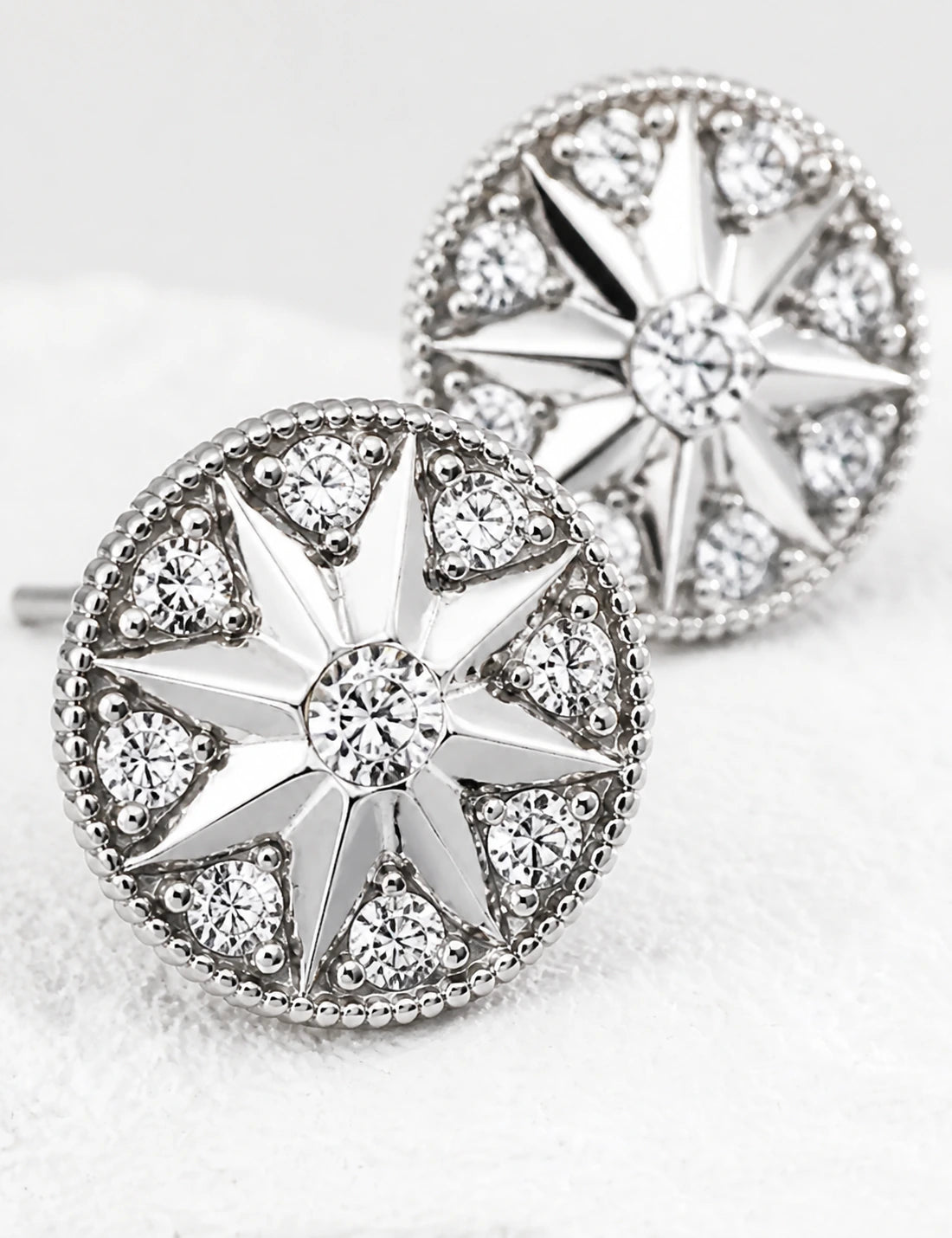 Rear and front view of Didcot sterling silver stud earrings, showing smooth backs and straight posts